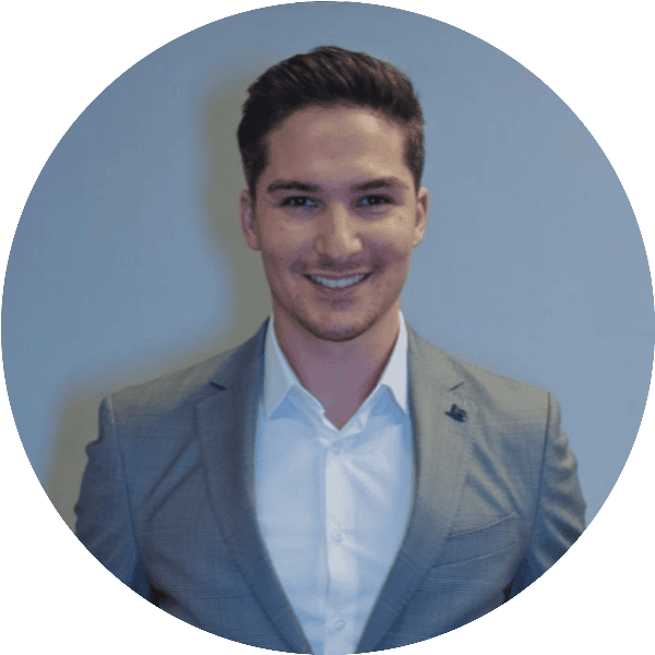 Professional young man in a suit smiling for digital marketing image.