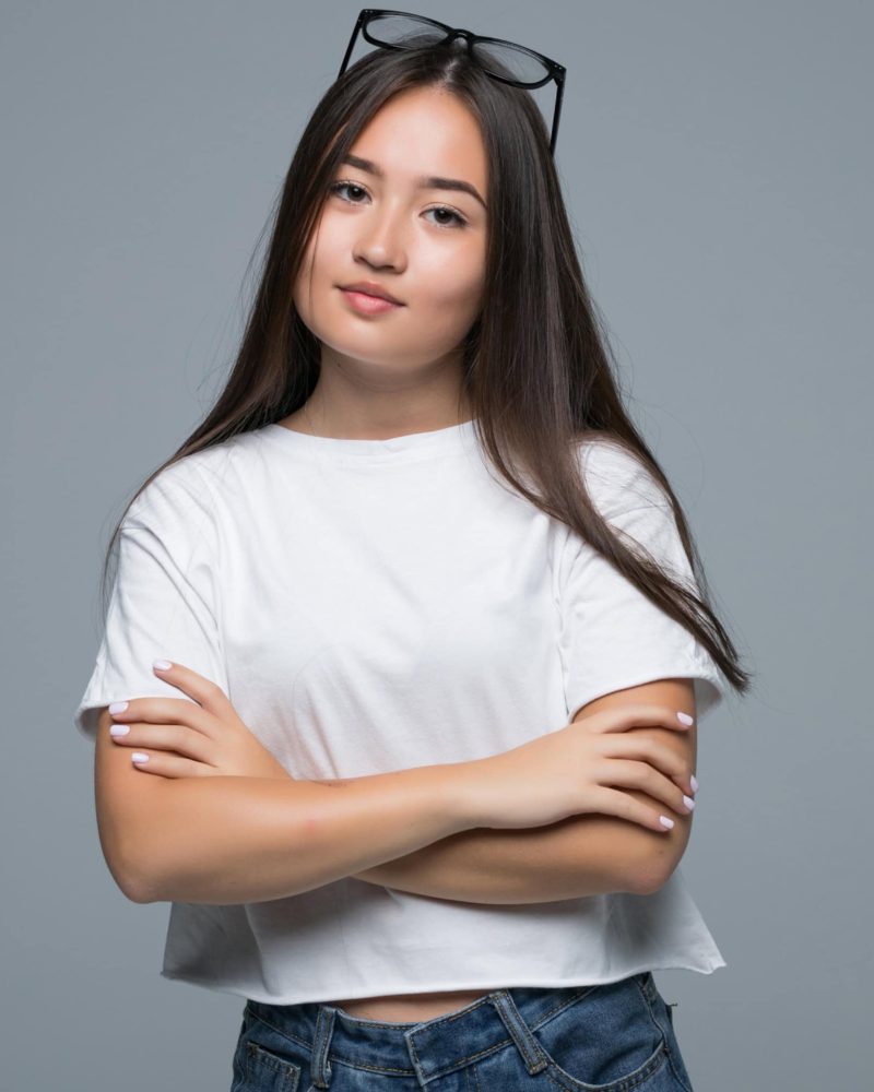 Confident young woman representing a digital marketing professional in a modern business environment